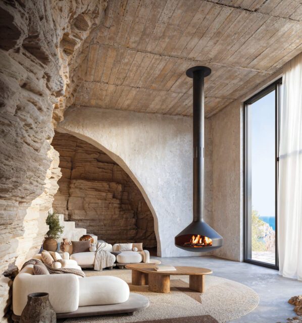 Chiemsee Öfen - Focus Ofen - Holzofen in Luxuswohnung in Natursteinoptik